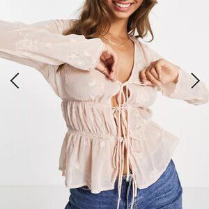 sheer feminine blouse tie front detail in pink